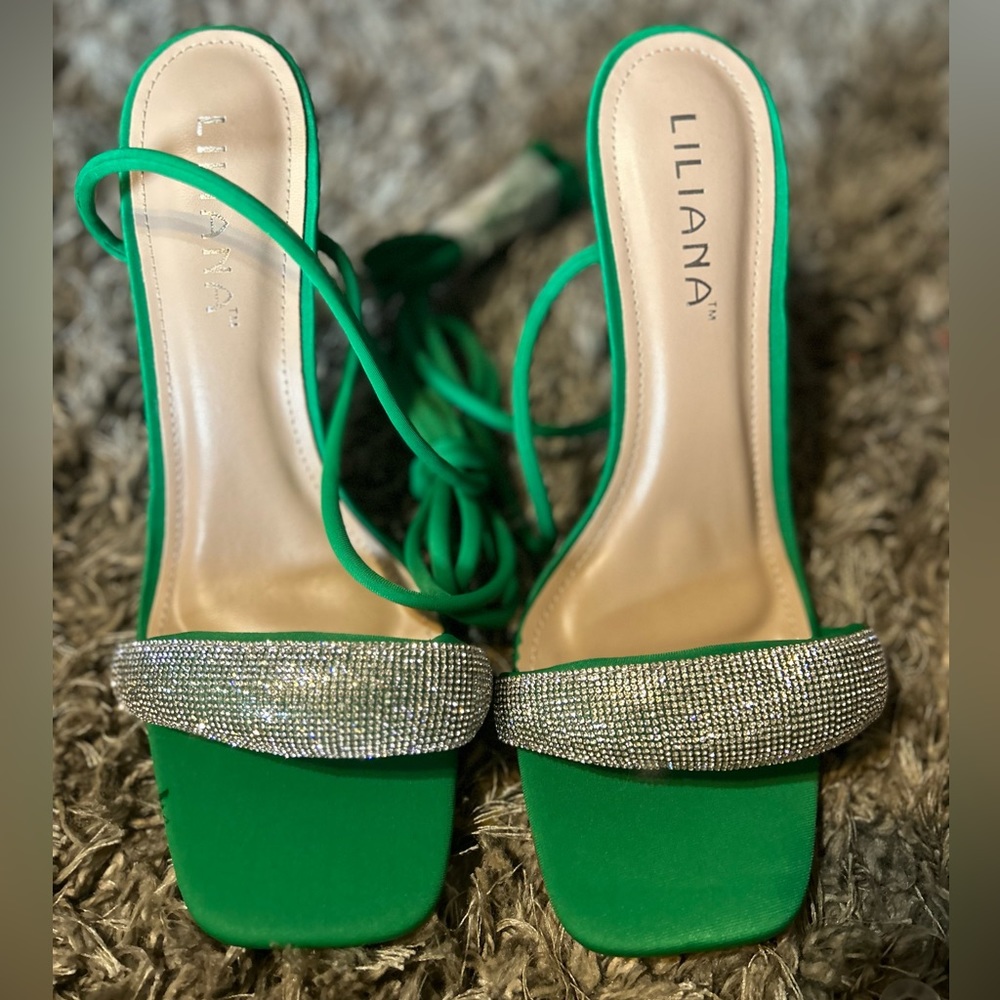 Emerald green Liliana 3in lace up heels never worn. Beautiful and blingy!